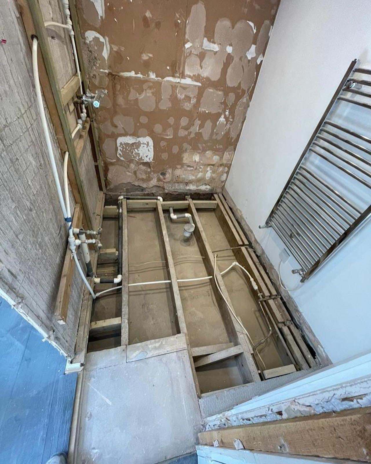 The Rigge Place bathroom stripped back to the joists before the new layout