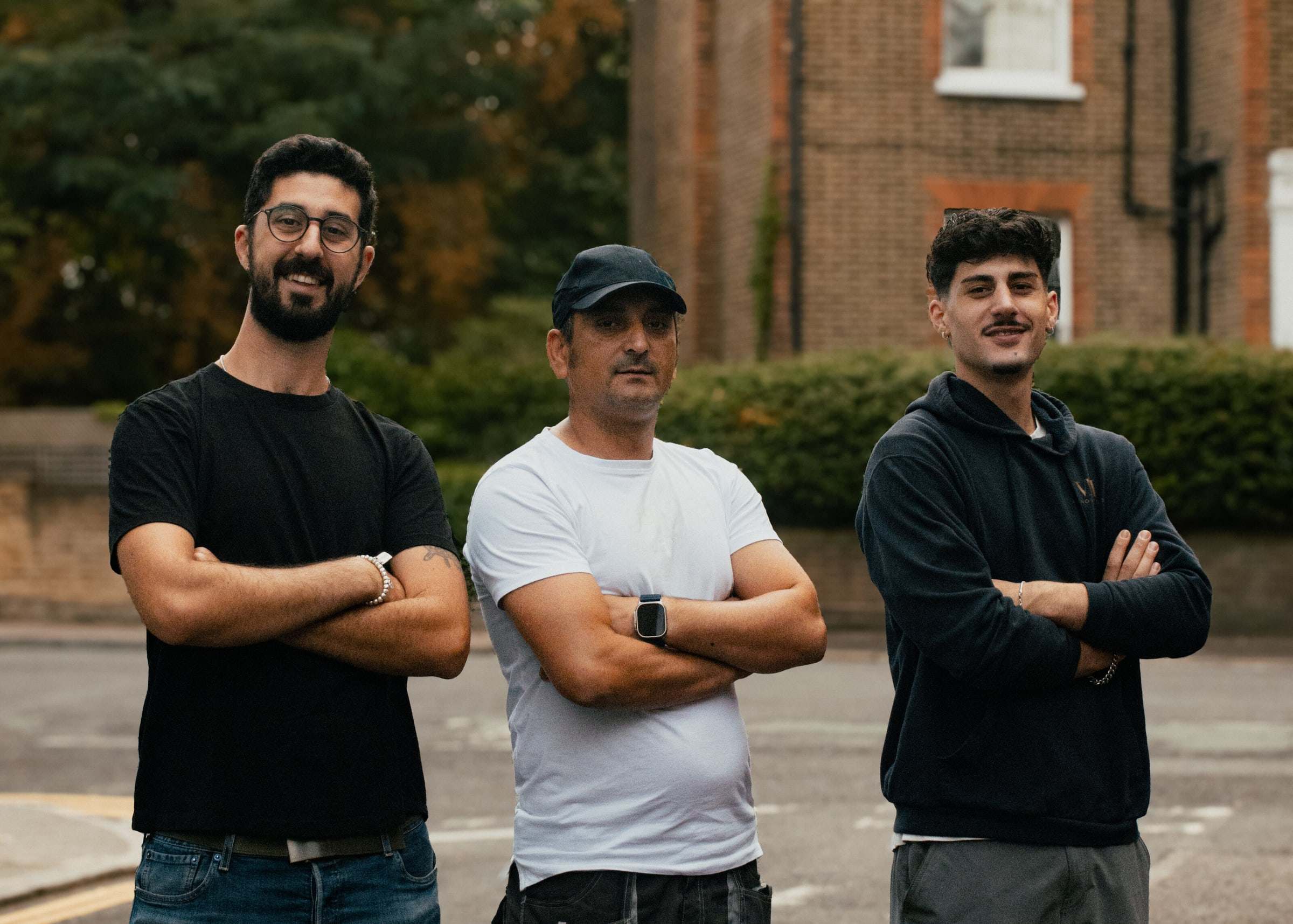 The VM Renovations team standing together on a London street