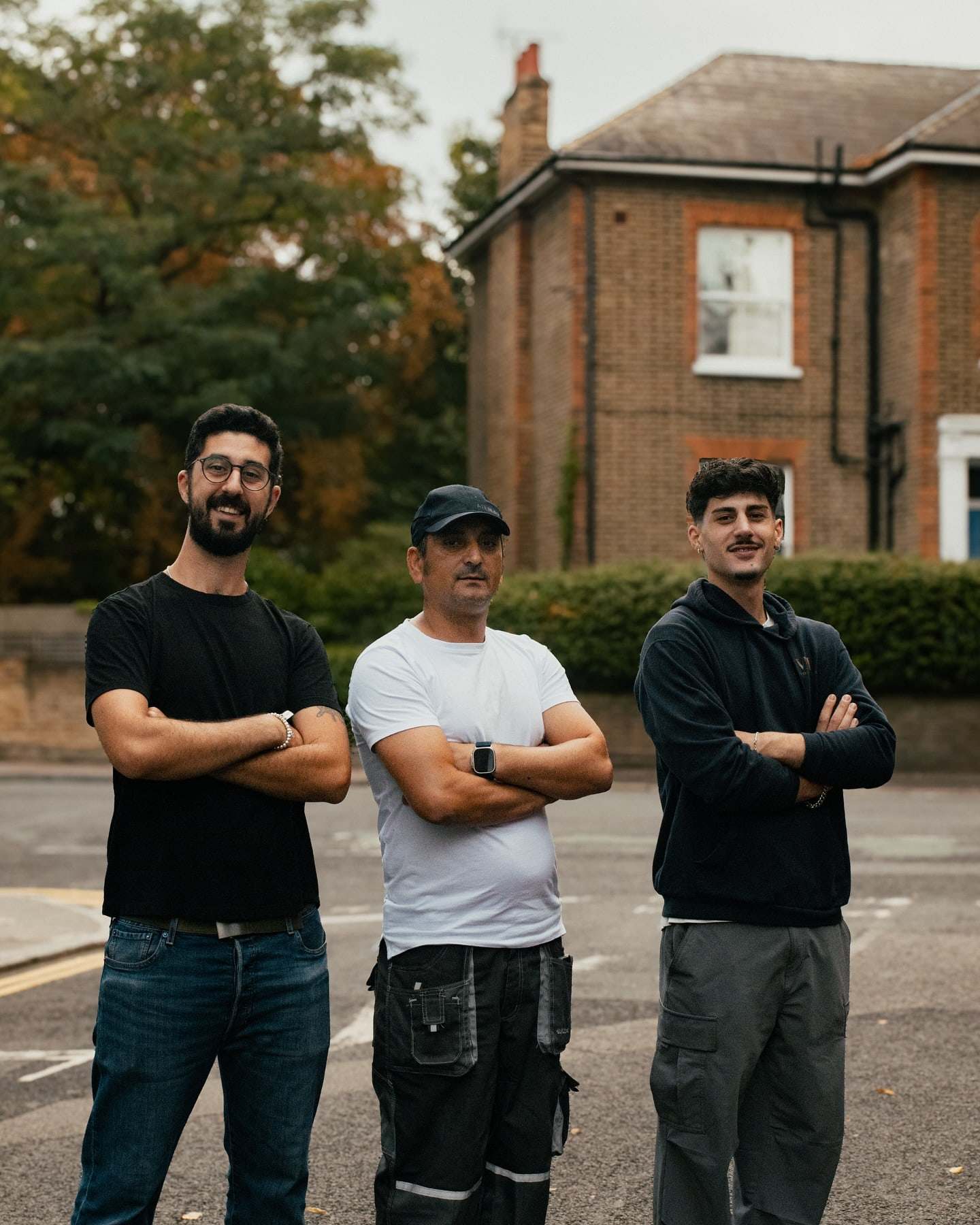 The VM Renovations team standing together on a London street